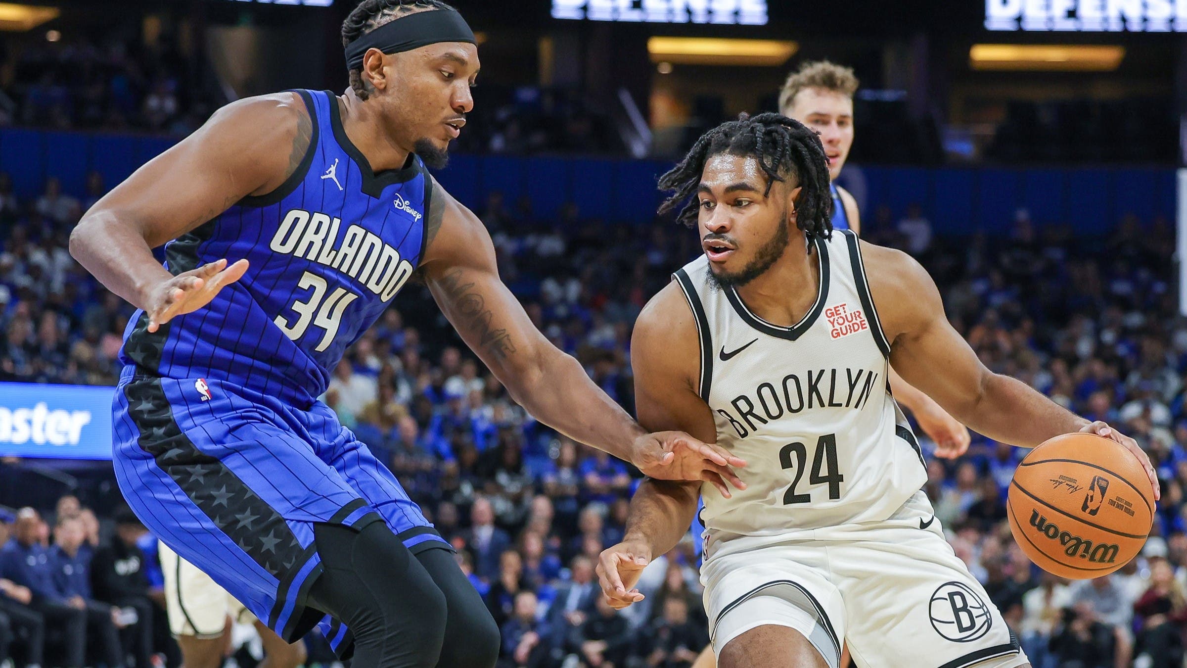 The Magic Win Home Opener in Scrappy Contest over the Nets